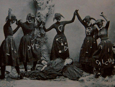 BuzzfeedB&W9 Witch-like female figures dancing around two dead (?) female figures